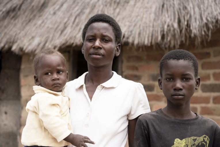 Fostina and her children at home in Central Province, Zambia