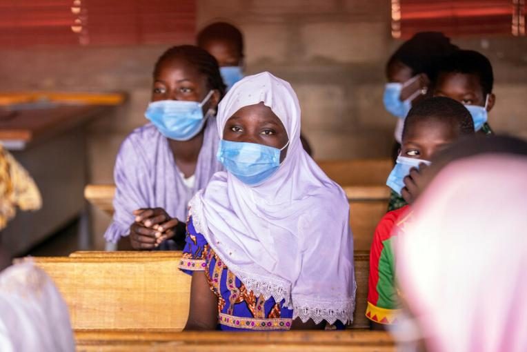 Zalissa, 14, and classmates at a school refurbished by Plan International in Burkina Faso.