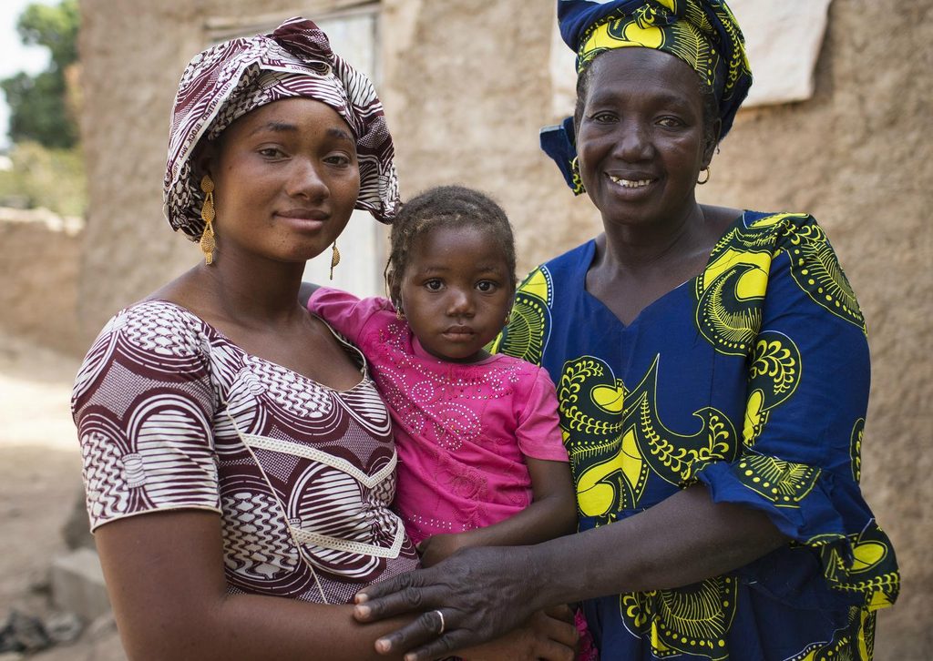  Grandmother Fatoumata, 55, with her daughter Sanaba and granddaughter Aissatou, 3..