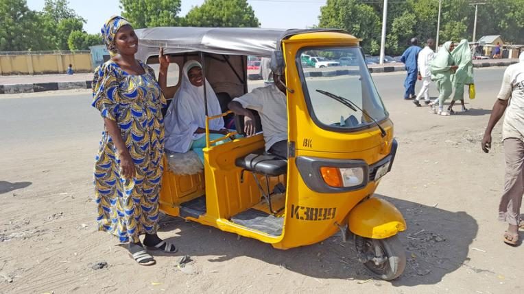Patim, 50, travels from her home to the learning centre by keke napep (a motorised tricycle).