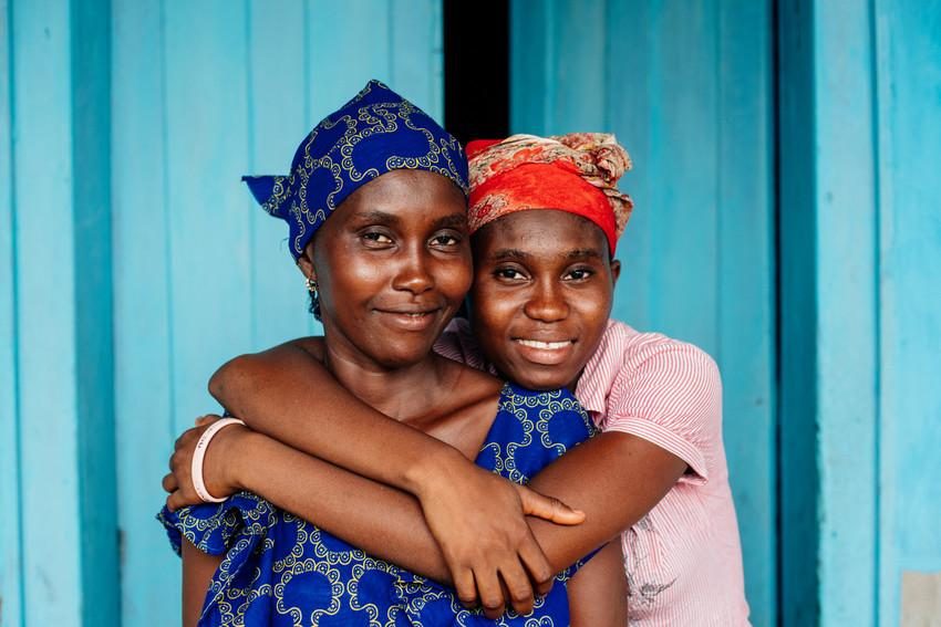 Zainab, 17, with her mother Kadiatu, a former FGM practitioner. 
