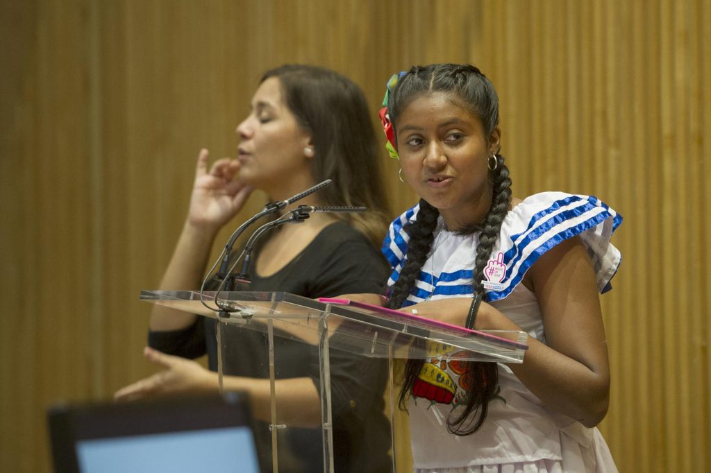Girl ambassador Brisa, 16, from Nicaragua speaks at the Spanish Parliament