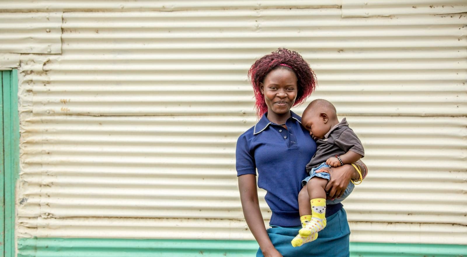 Young mother with her son in Bondo district in western Kenya.