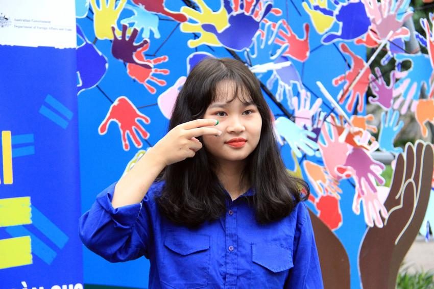 Girl shows her support for Girls Get Equal in Vietnam.
