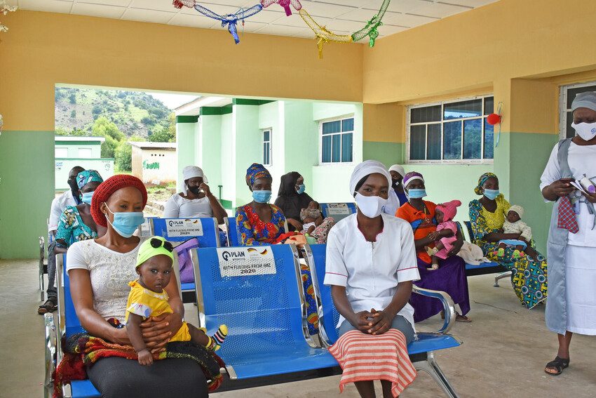 Mothers take their babies to be checked at health centre in Nigeria