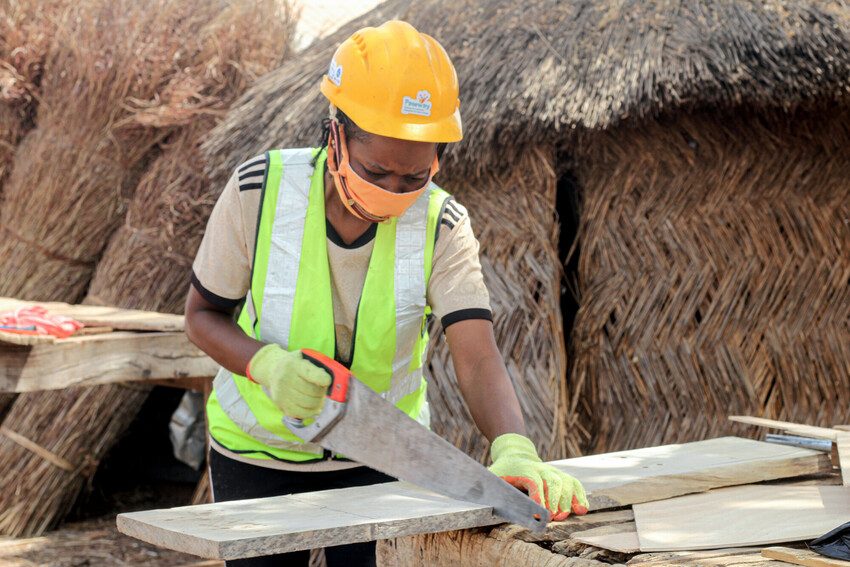 Young woman doing carpentry work in Ghana.
