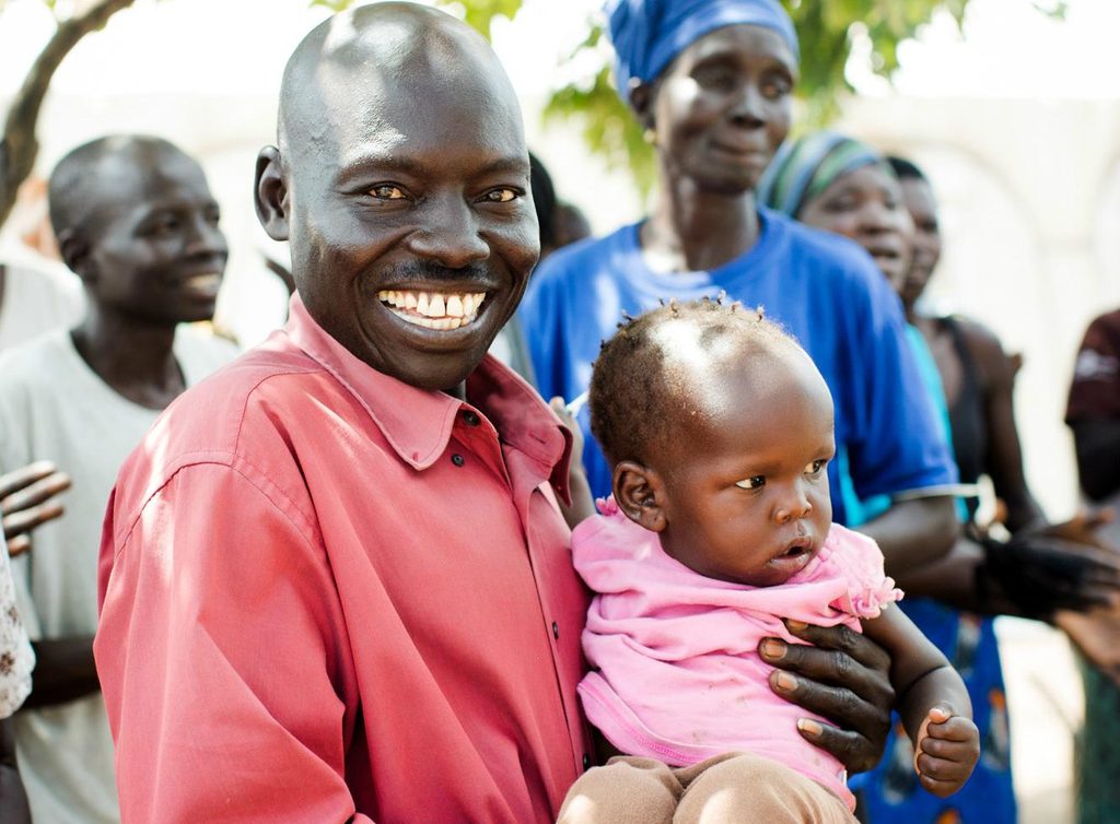 A father with his daughter in Uganda