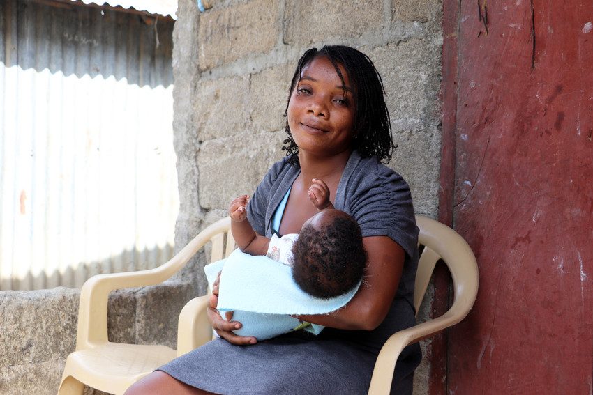 World Breastfeeding Week. This is a photograph of Nadia, 28, from Haiti and her baby son.
