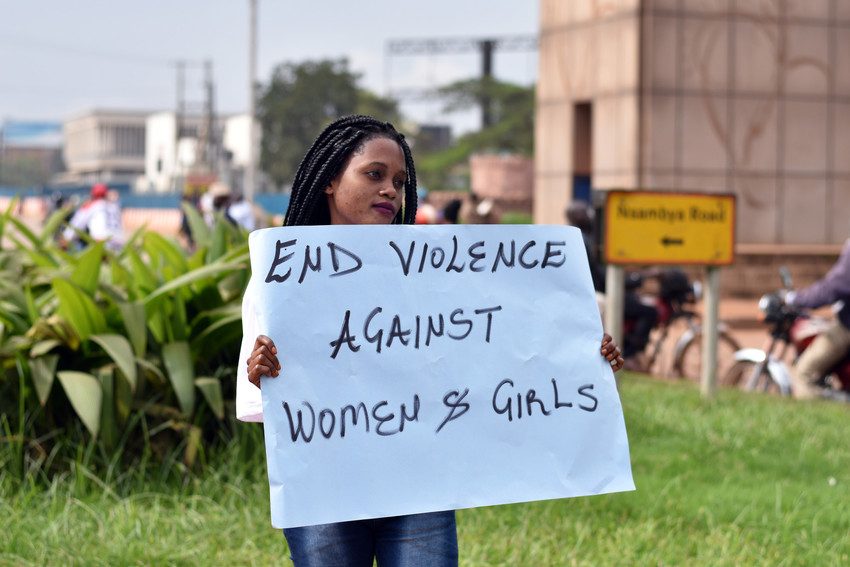 End VAWG, girl with sign, activist, gender equality