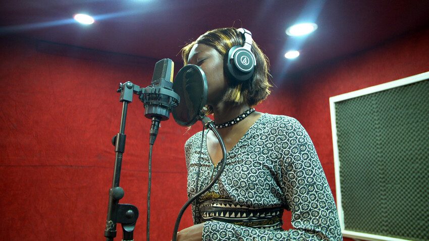 Maguette, 25, sings about empowering women in the studio.