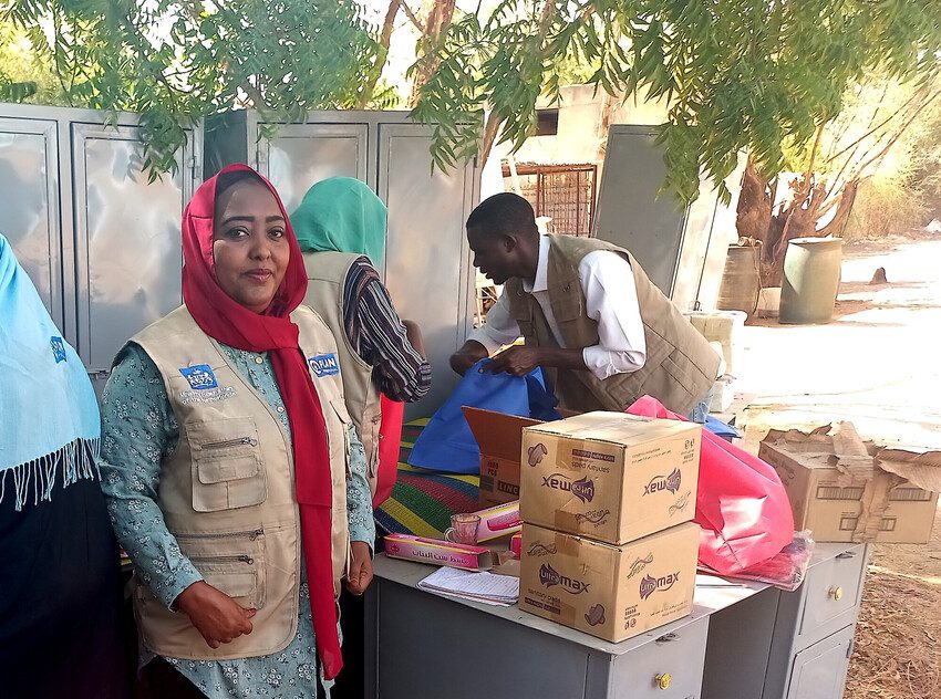 Alaa Abusifian is emergency response coordinator in Sudan. She is pictured organising aid, including dignity kits for girls. 