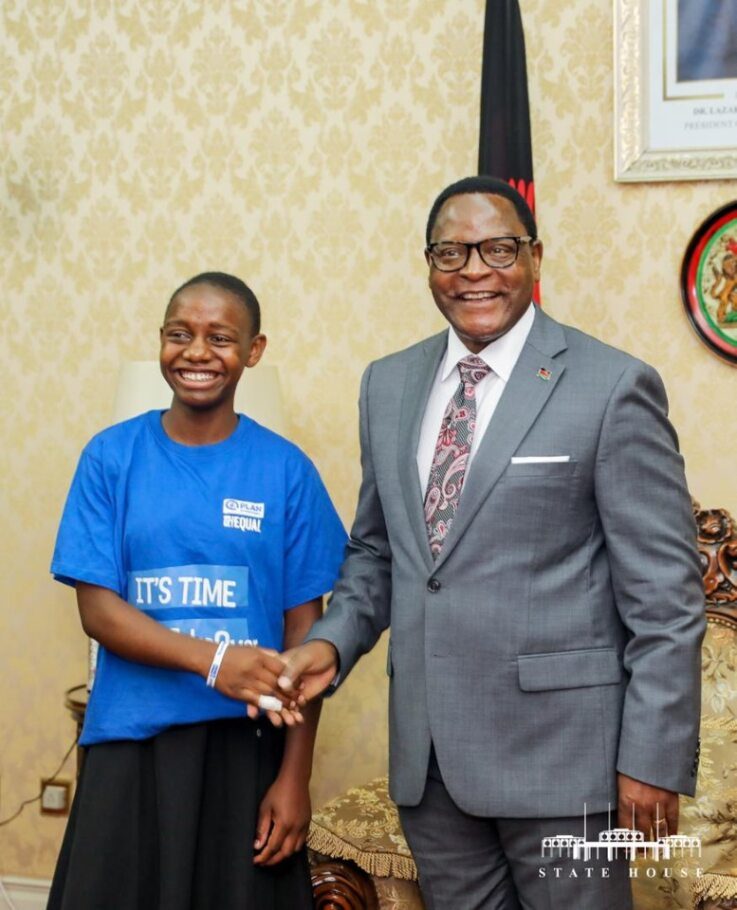 Patience, 17, Malawi shaking President Lazarus McCarthy Chakwera's hand. 