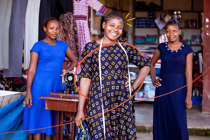 Solitha, 29 (centre), mentors girls from her local community who want to learn to sew.