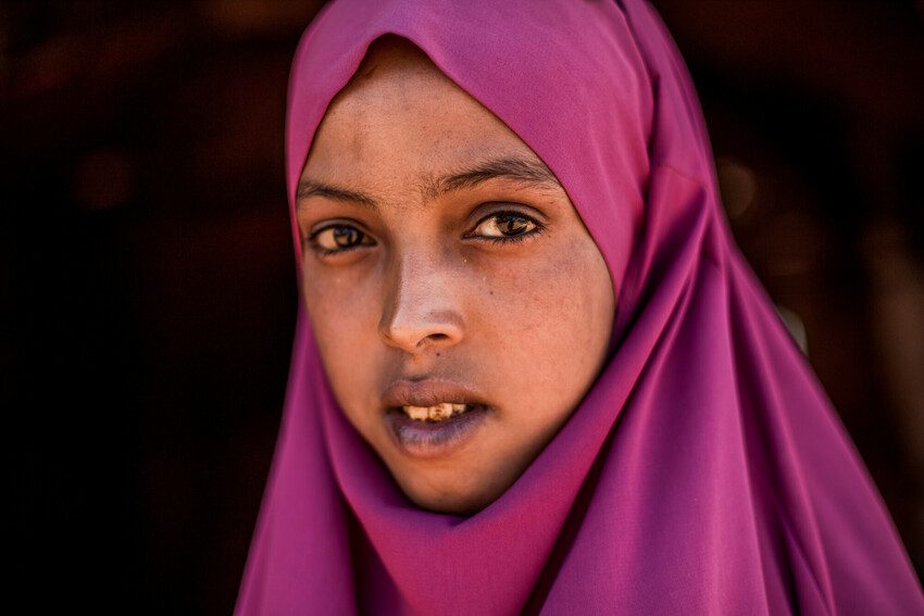 Barwaaqe who advocates awareness of the harms of FGM looks at the camera. 