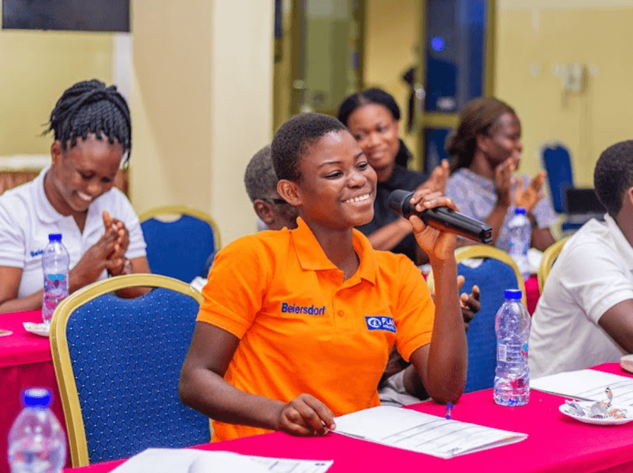 Girl speaking during seminar. 