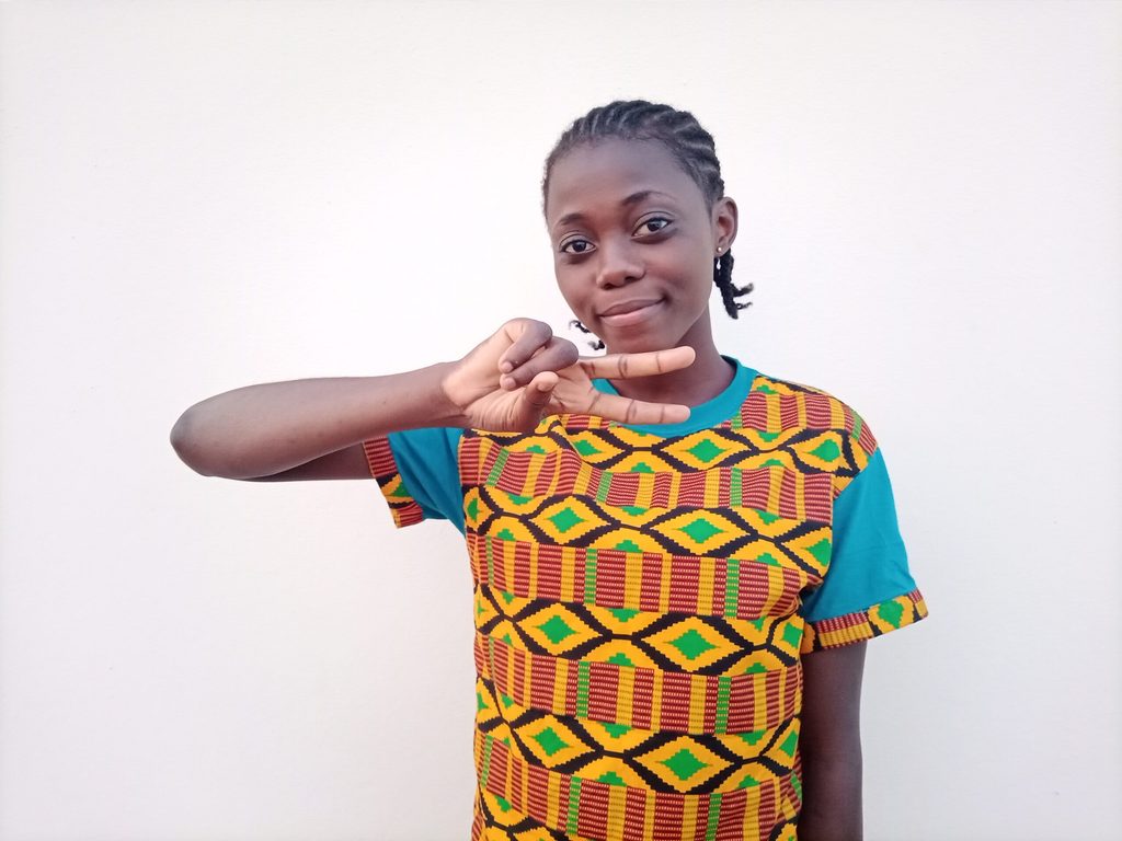Dorcas, 20 ans, est une ardente défenseure des droits des filles au Togo.
