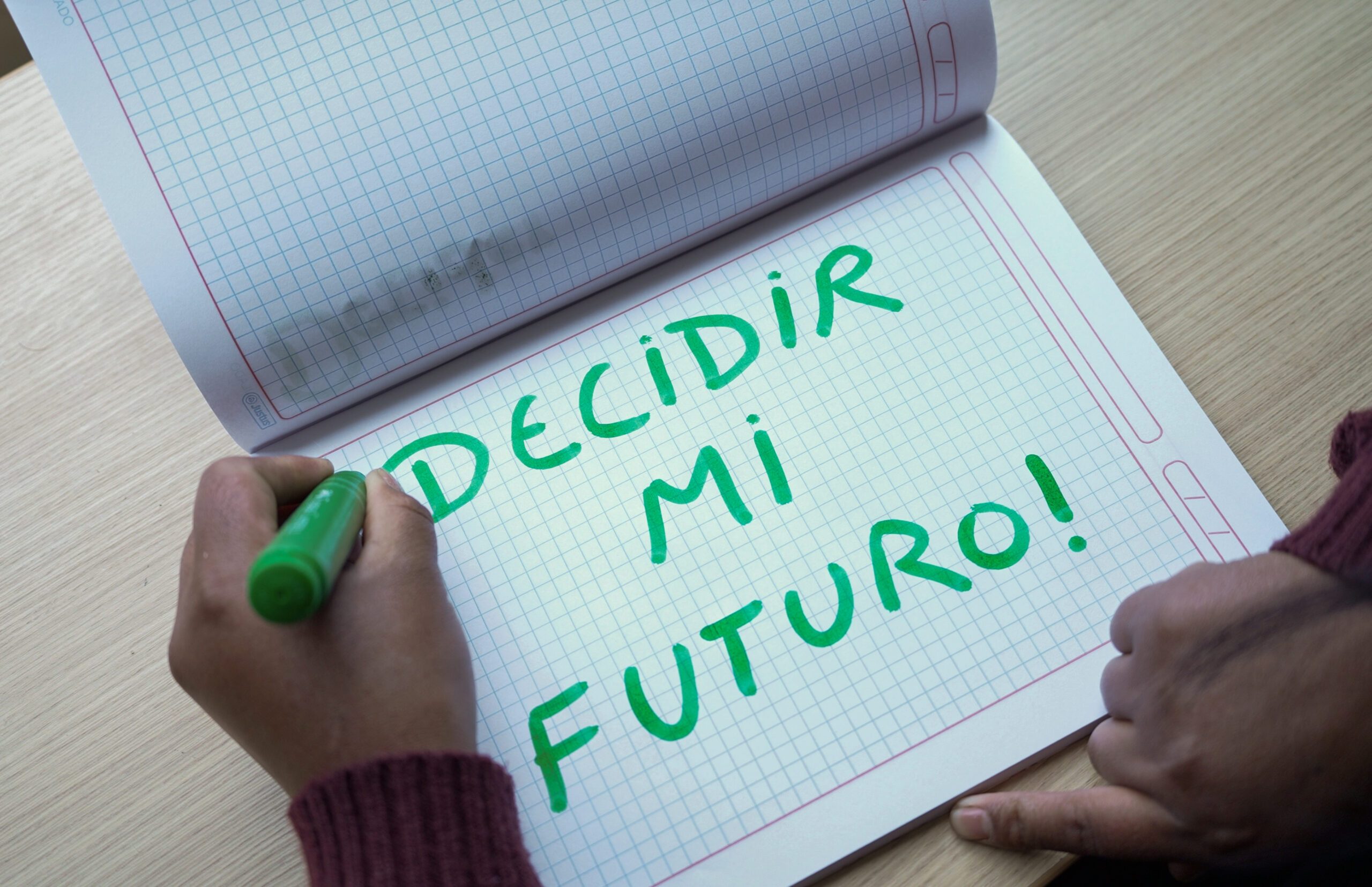 Cuaderno con frase motivadora de adolescente.