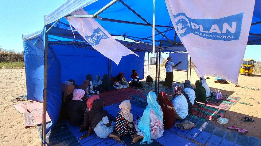 The mobile child protection unit with adolescent girls taking part in a session. 