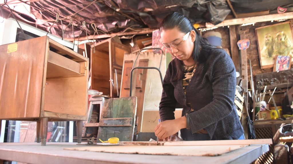 Ana working in her workshop.