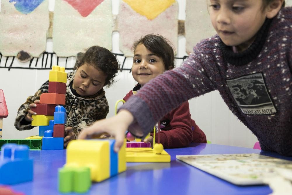 Amira* playing at the Plan International-run pre-school centre