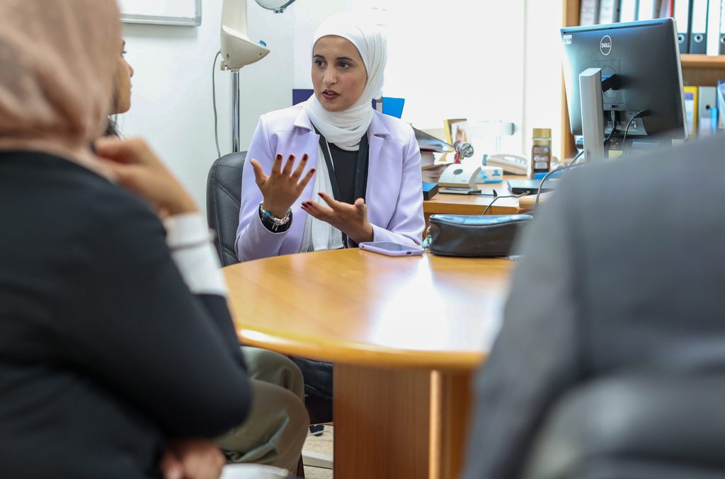 A young woman leading a meeting in Jordan