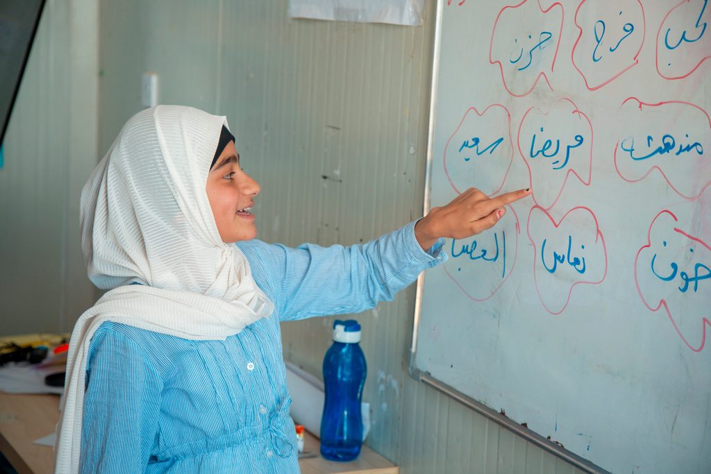 A girl learning at school