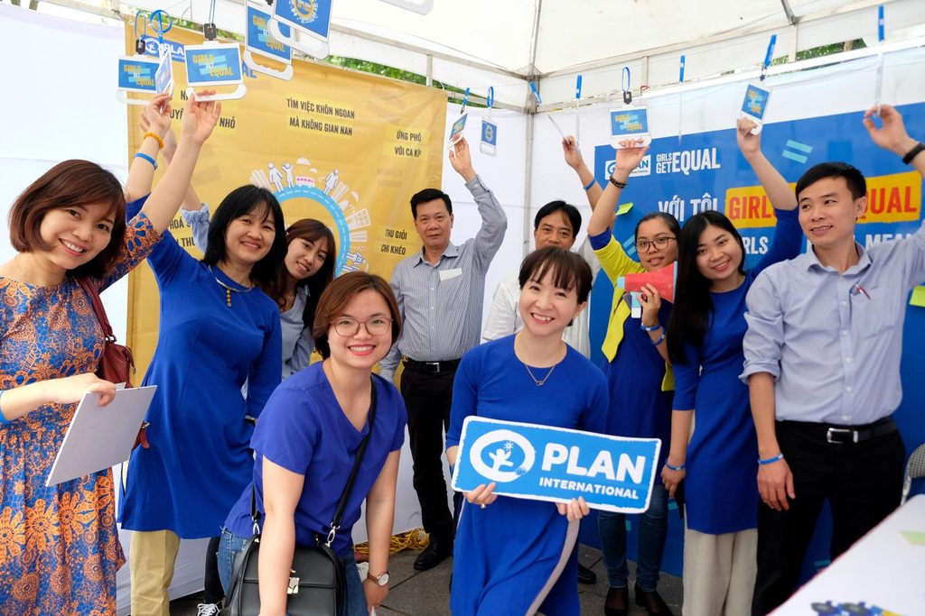 Plan International Vietnam staff on the safety bus for Girls Get Equal