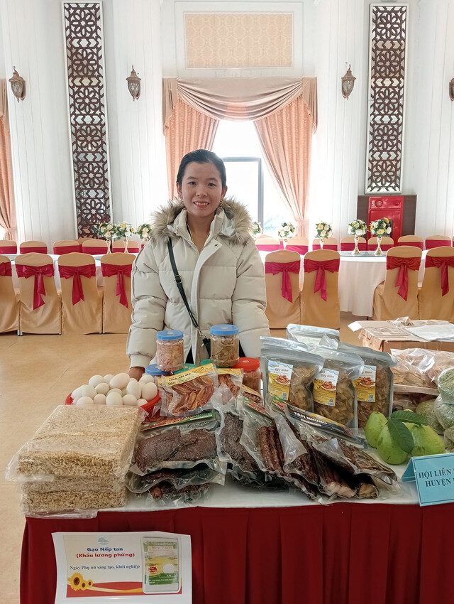 Pham displays her dried bananas snack at the food exhibition