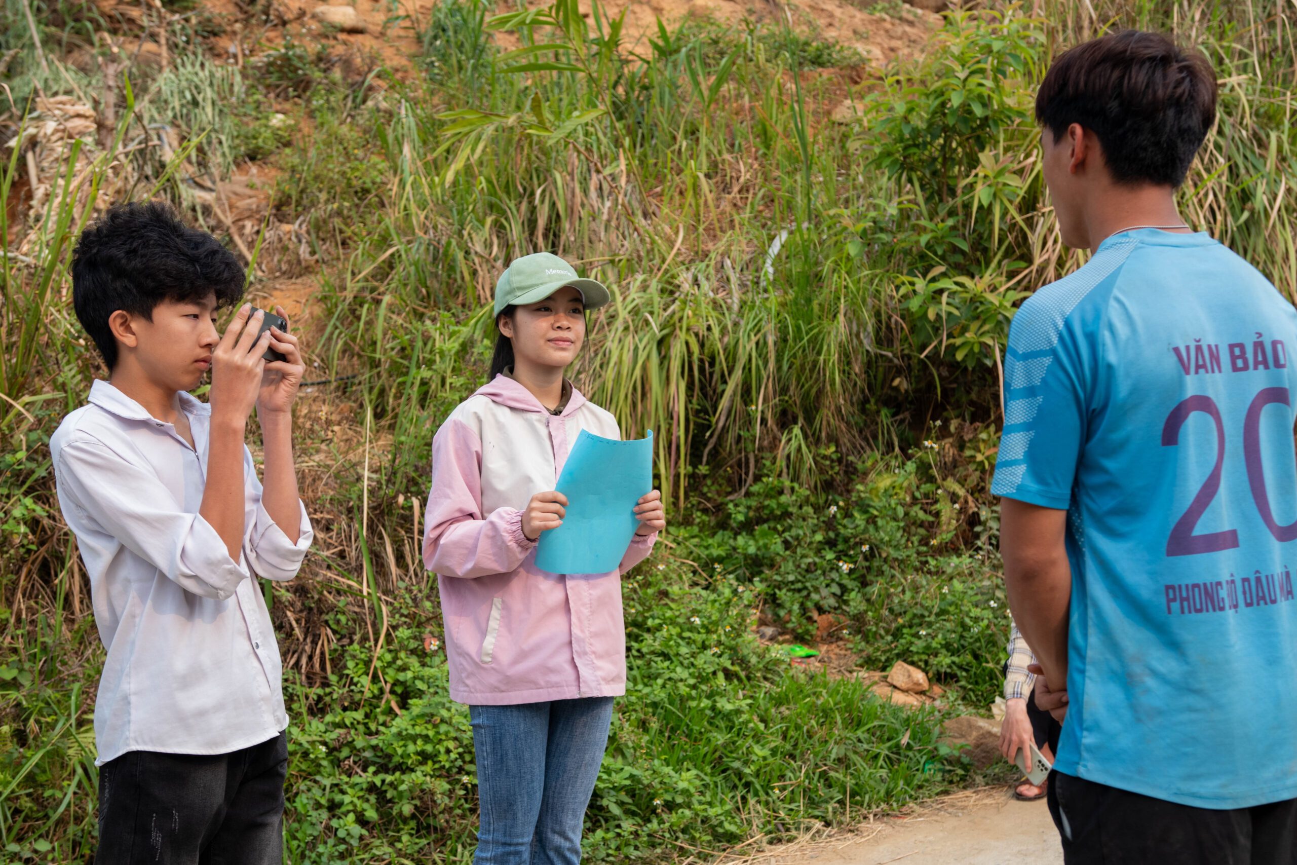 Huyen and her team interviewing a community member
