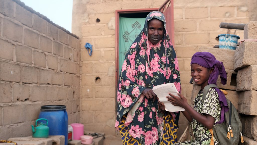 Salimata at home with her mother in Mopti region