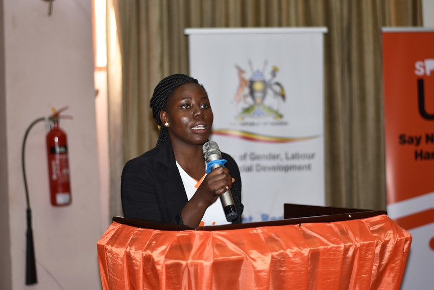 Young woman speaks at the 16 Days of Activism launch event in Uganda