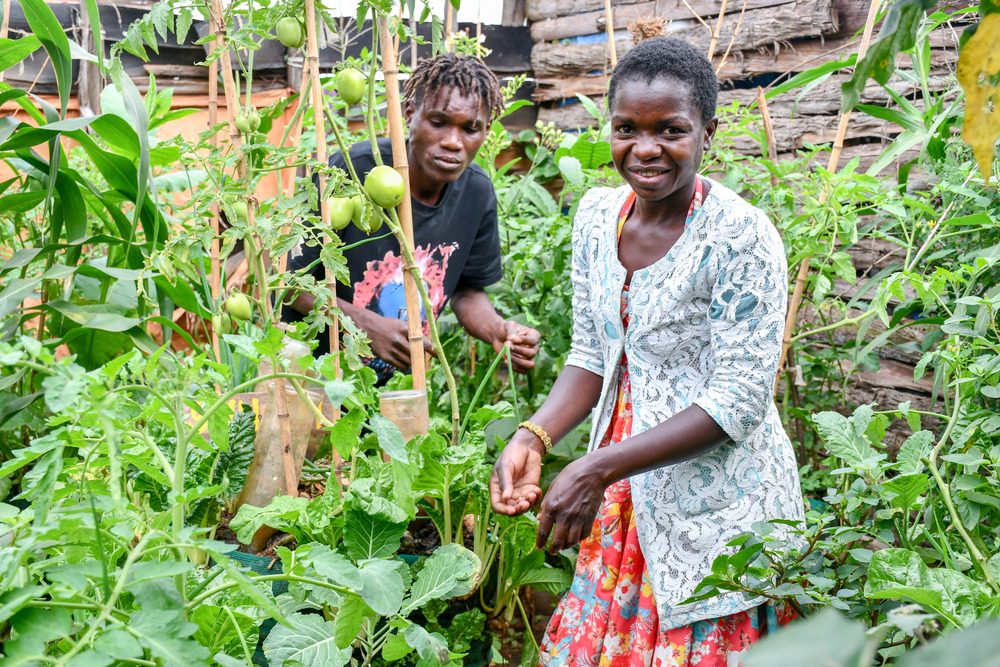 Young people in Kamwokya ghetto community practice urban farming to preserve the environment.