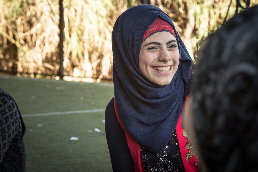 Samiha, 18, takes part in activity at workshop on child marriage