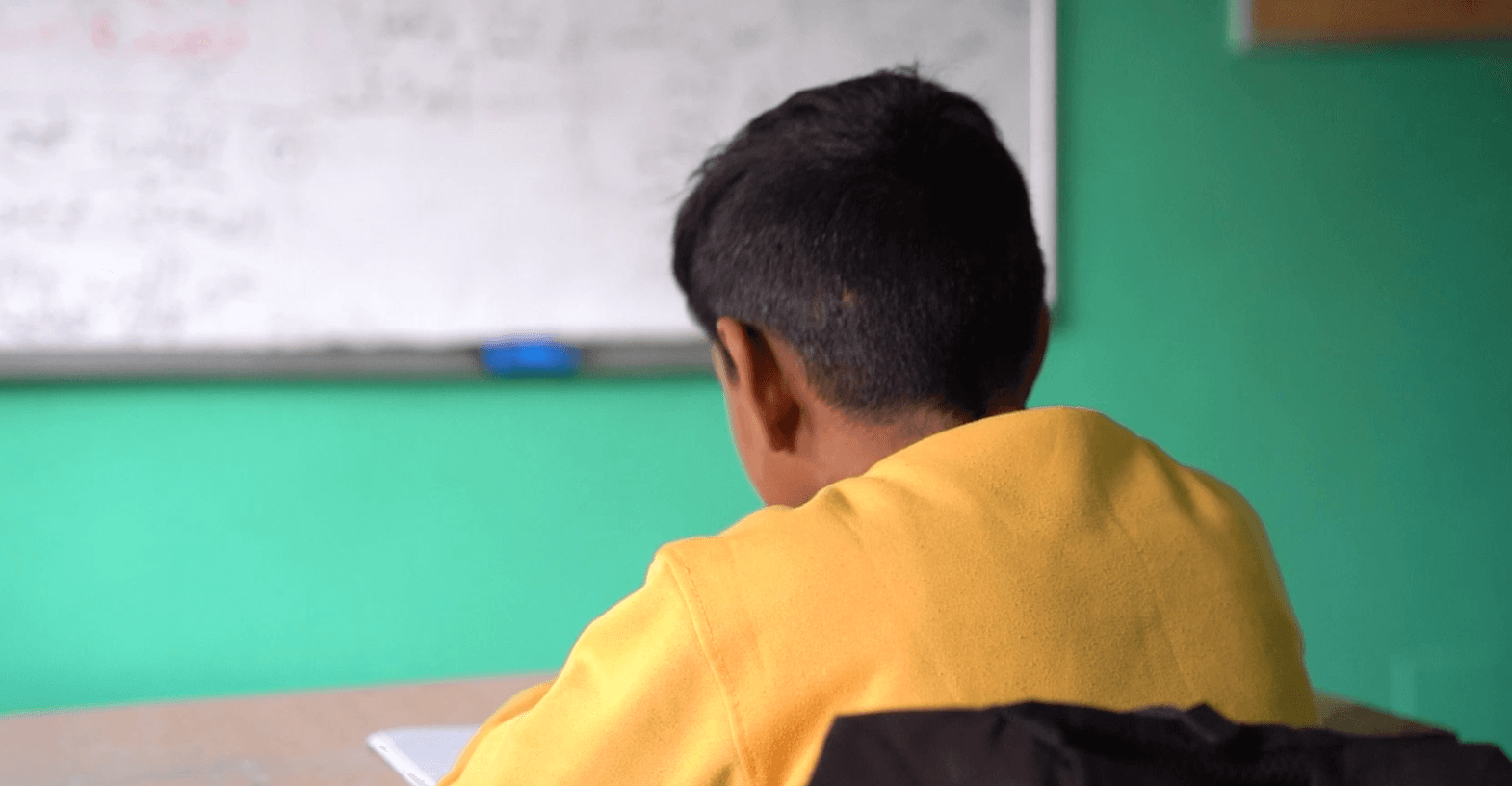 khodr sitting in the classroom