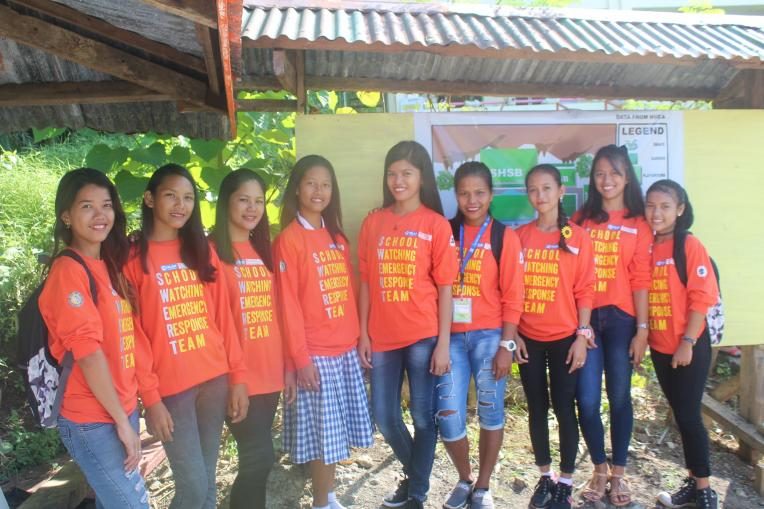 Danica (middle), together with all the SWERT members, poses for a team photo after the DRRM Camp.