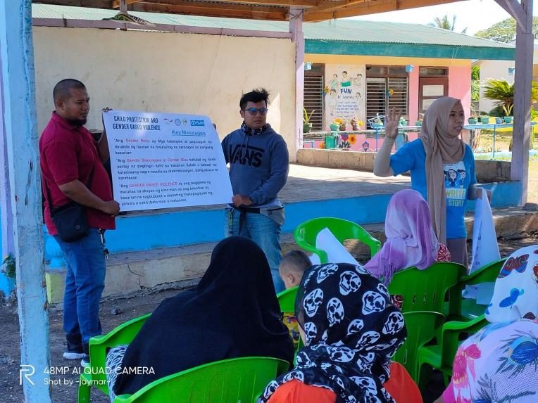 In photo: Child Protection Specialist Rabia Mustapha (right)