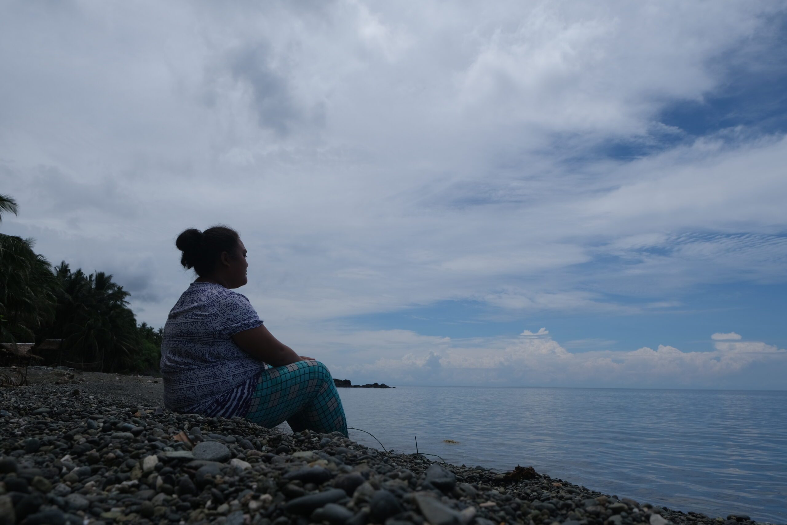 Myrell, a second-year marine biology student, looks out to the sea