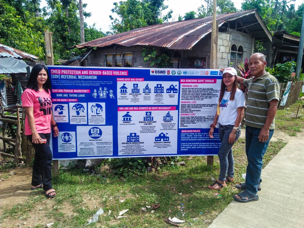 Miguela, with her co-CFS volunteers, after installing the Referral Pathway in their community 