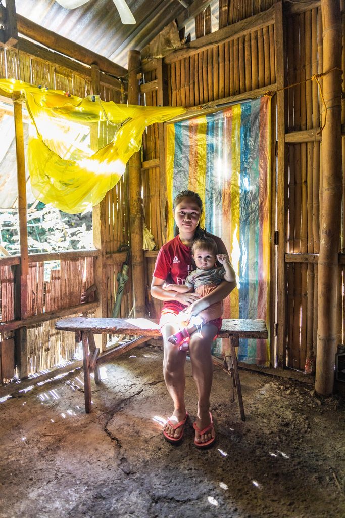 Gwyn and her daughter pictured in their house. Gwyn’s parents used to live with them, but after her dad passed away, her mother became an Overseas Filipino Worker (OFW) in Saudi 