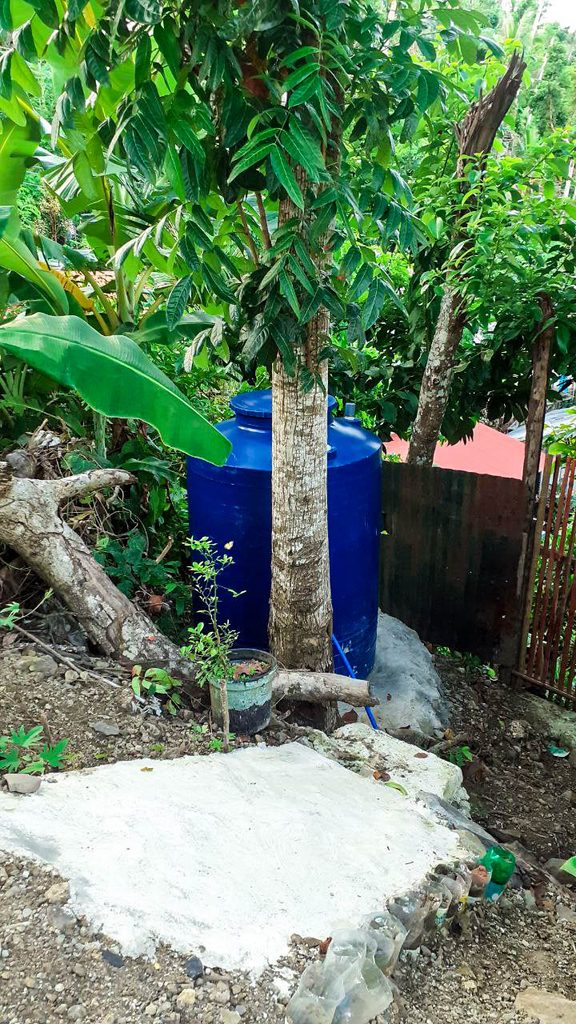 A water tank from the newly repaired and improved water system in Samuel’s barangay