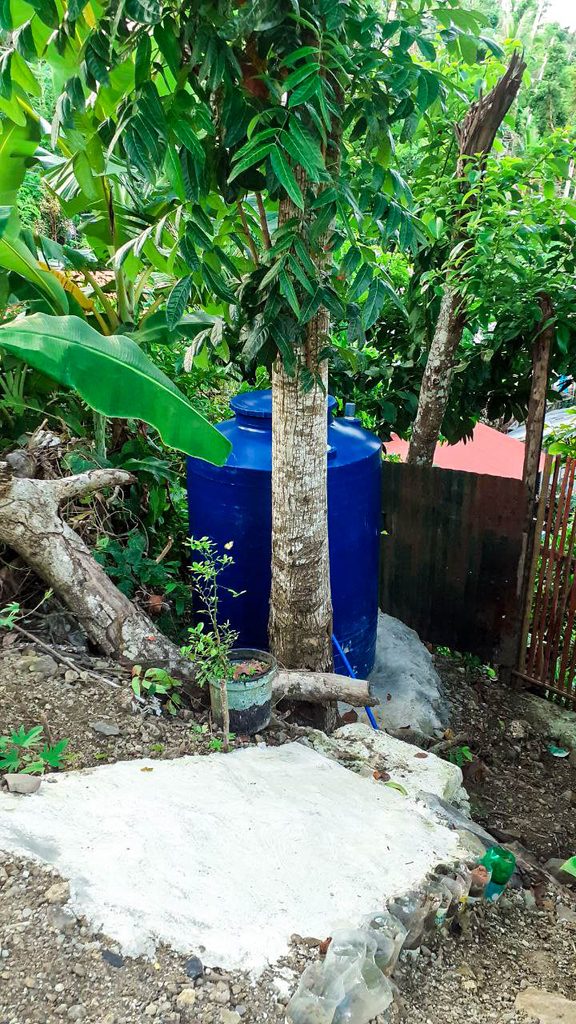 A water tank from the newly repaired and improved water system in Samuel’s barangay 