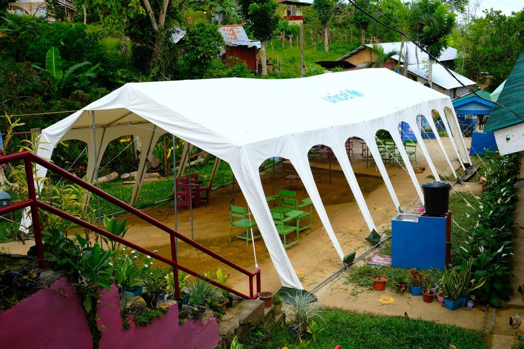 The Temporary Learning Space (TLS) tent provided by UNICEF in the school’s courtyard 