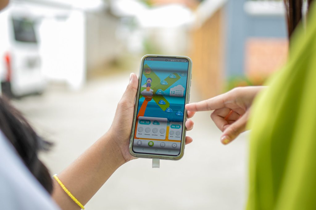 A smartphone displays a period tracking app called "Oky"
