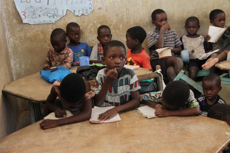 Children barely concentrating during a class session because of the drought.