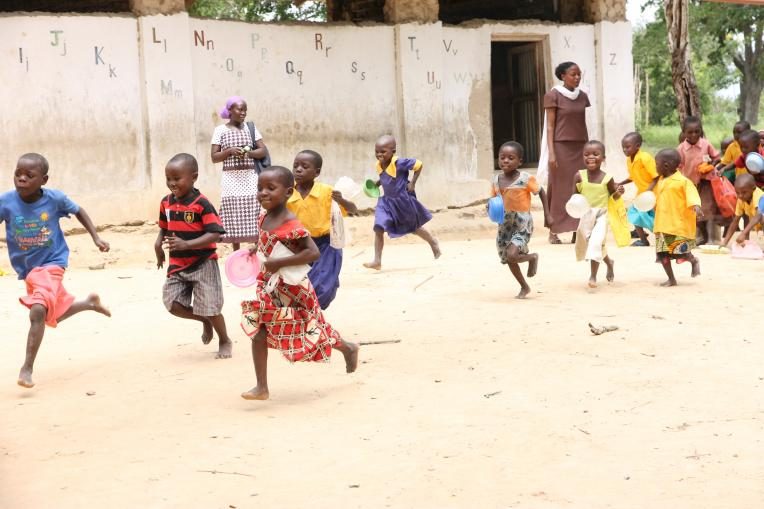 Children rushing to get some food during their lunch break