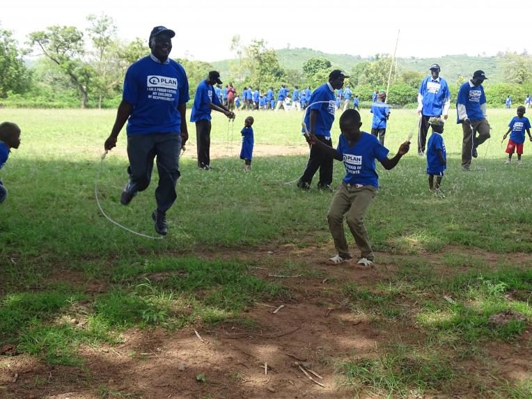 Fathers playing with their children during the Father-Child day out