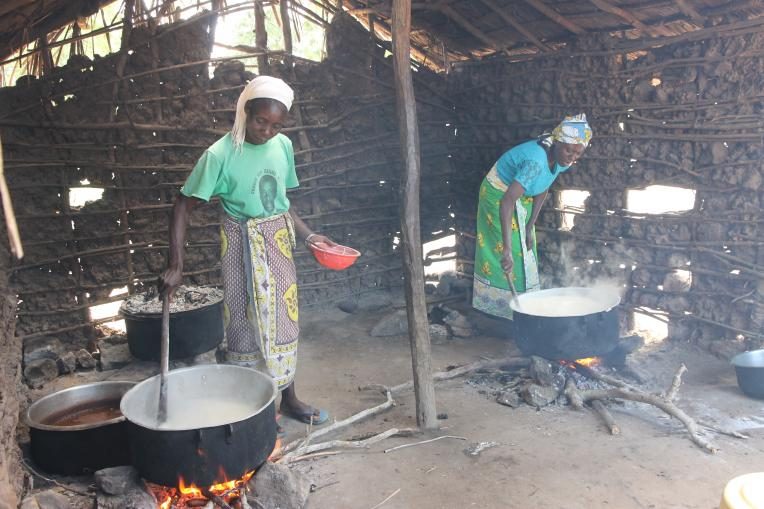 Parents volunteer to help with cooking and feeding children