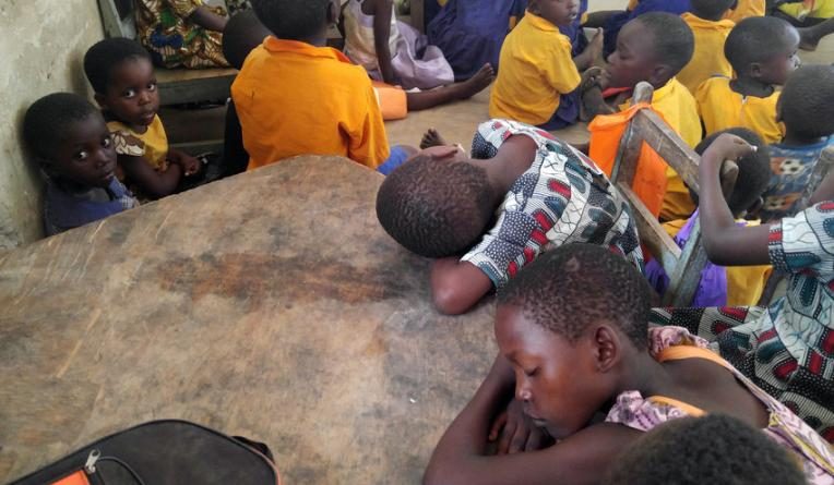 The lack of food has caused school children to fall asleep at their desks.