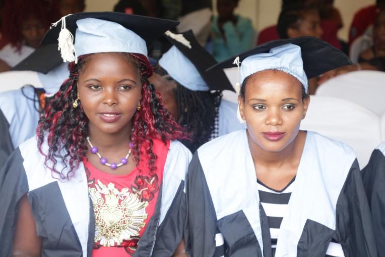Naiserian and a classmate during their graduation from the vocational training centre