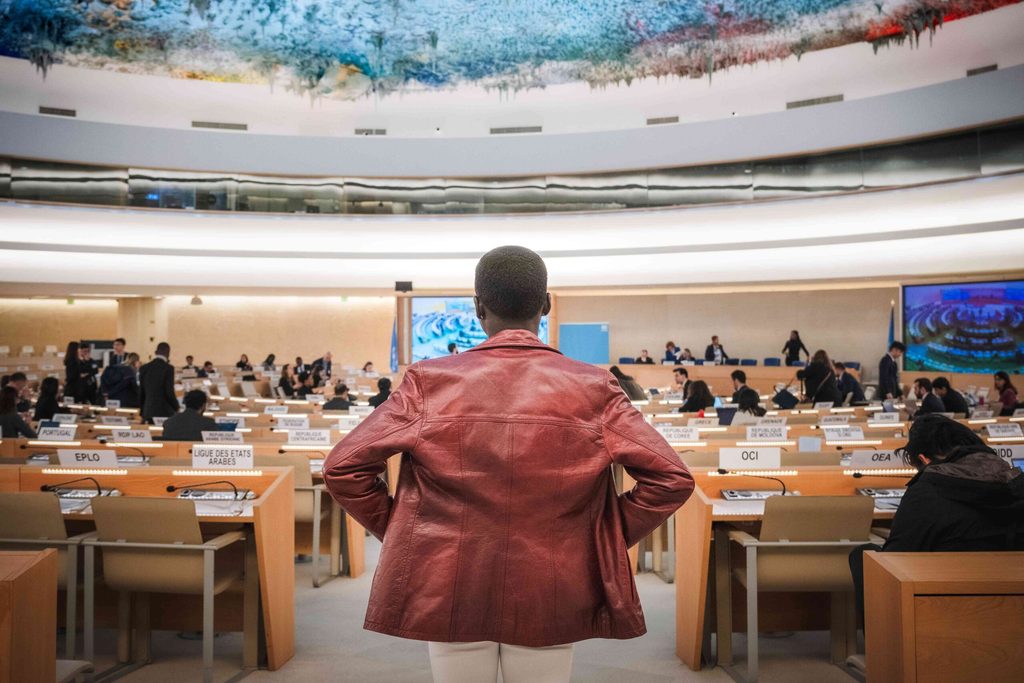 Marie-Reine prepares to make her statement at the 55th session of the Human Rights Council.